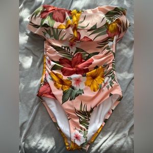 Kona Sol small one piece strapless(comes with optional straps) bathing suit.